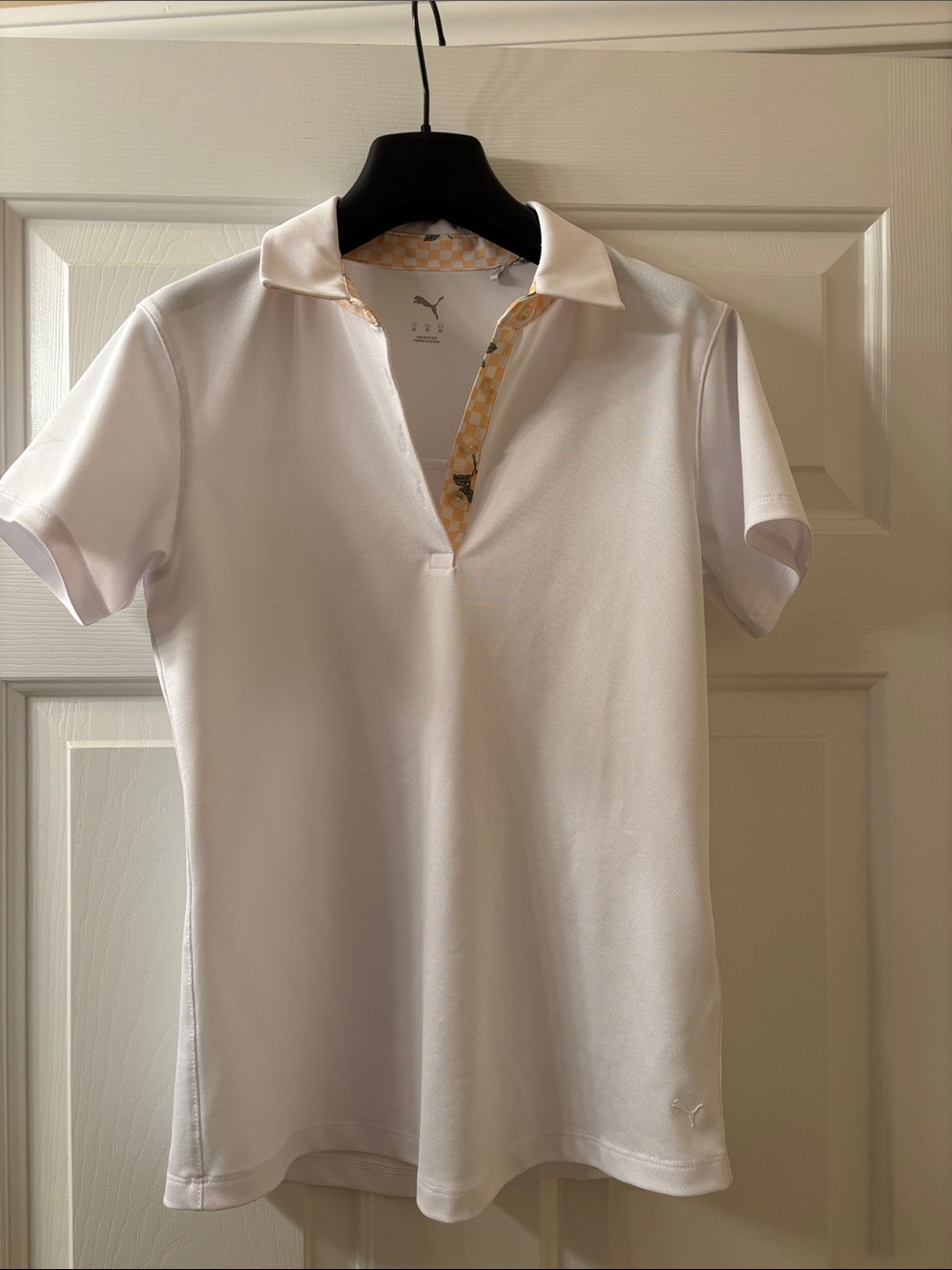 Puma White Short Sleeve Polo with Subtle Yellow-Patterned Placket